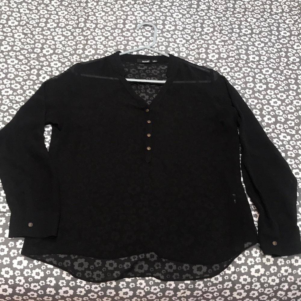 Long sleeved sheer dressy top.